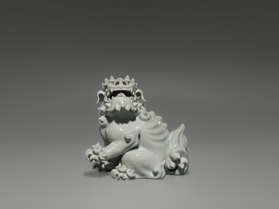 Lot 1584 - A CHARMING HIRADO WHITE-GLAZED OKIMONO OF A SHISHI