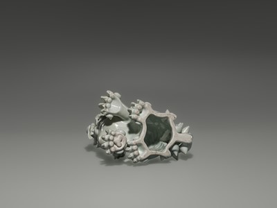 Lot 1584 - A CHARMING HIRADO WHITE-GLAZED OKIMONO OF A SHISHI