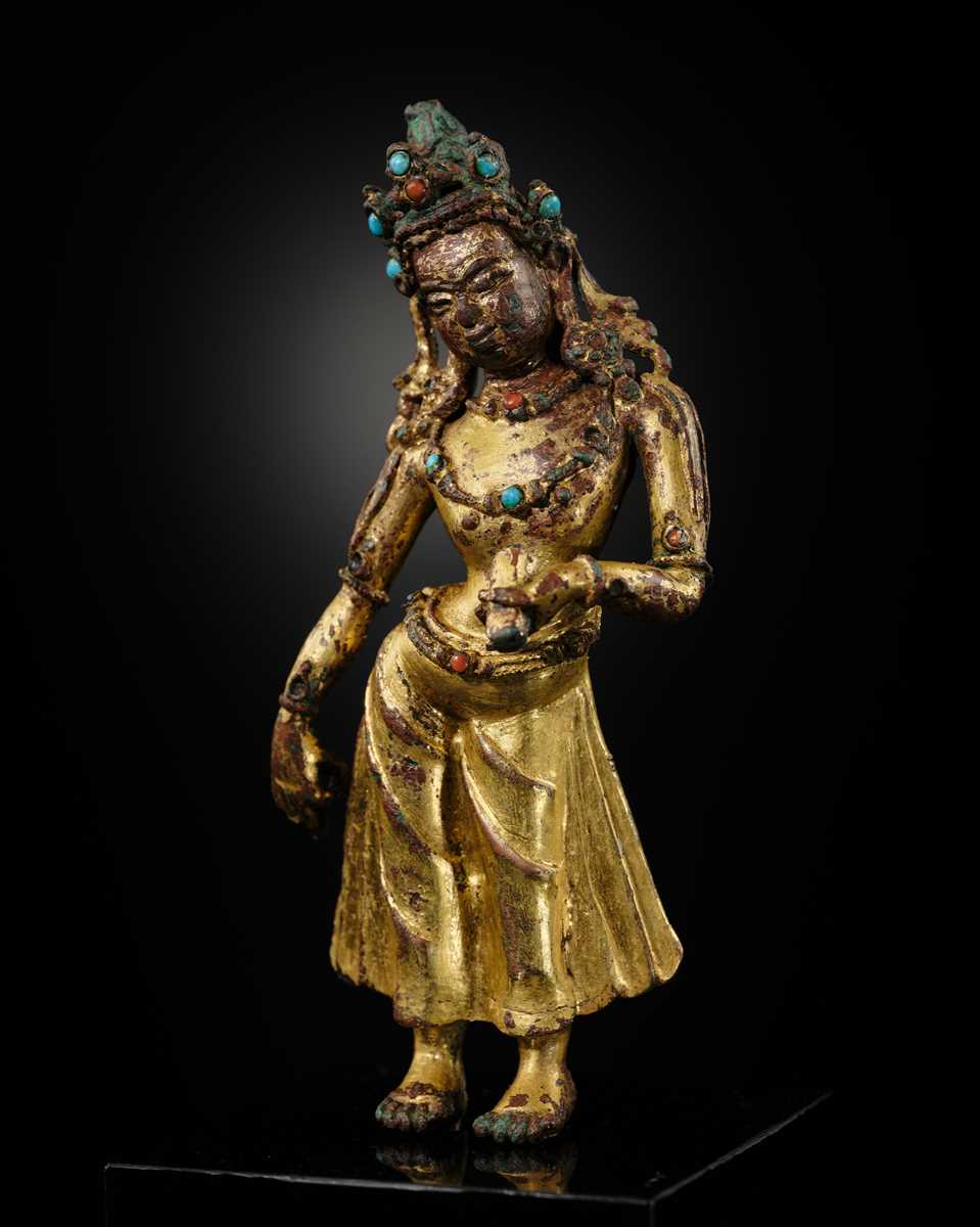 A GILT-BRONZE FIGURE OF TARA, EARLY MALLA PERIOD, 1100 – 1382 AD