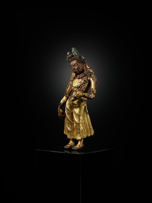 A GILT-BRONZE FIGURE OF TARA, EARLY MALLA PERIOD, 1100 – 1382 AD