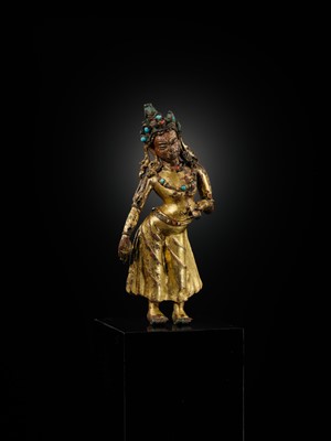 A GILT-BRONZE FIGURE OF TARA, EARLY MALLA PERIOD, 1100 – 1382 AD