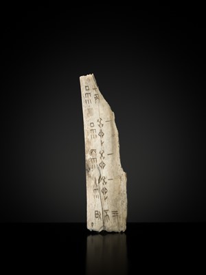 Lot 110 - AN INSCRIBED ORACLE BONE, SHANG DYNASTY