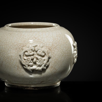 Lot 249 - AN UNUSUAL MOLDED DEHUA WATER POT, QING DYNASTY