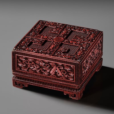Lot 59 - AN IMPERIAL CINNABAR LACQUER ‘TREASURE’ BOX AND COVER, QIANLONG PERIOD