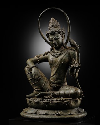 Lot 465 - A FINE BRONZE FIGURE OF PADMAPANI, CENTRAL JAVA, INDONESIA, 9TH CENTURY