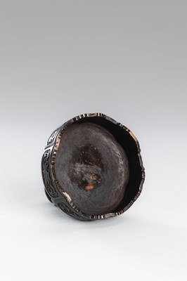 A SMALL COPPER ALLOY FIGURE OF BUDDHA