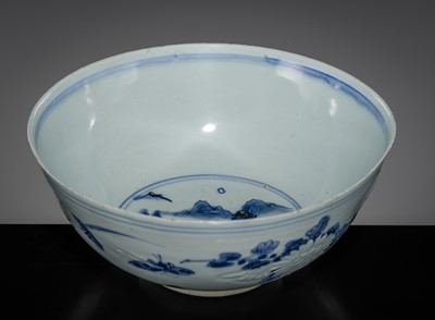 Lot 174 - A CARVED BLUE AND WHITE ‘FLORAL’ BOWL, TRANSITIONAL PERIOD, FROM THE HATCHER CARGO