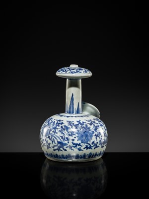 Lot 25 - A RARE BLUE AND WHITE DISKED KENDI, TRANSITIONAL PERIOD, FROM THE HATCHER CARGO