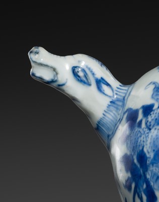 Lot 171 - A BLUE AND WHITE FLATBACK KENDI, TRANSITIONAL PERIOD, FROM THE HATCHER CARGO