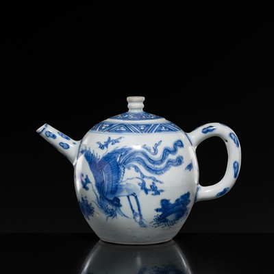 Lot 172 - A BLUE AND WHITE ‘QILIN AND PHOENIX’ TEAPOT AND COVER, TRANSITIONAL PERIOD, FROM THE HATCHER CARGO