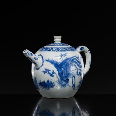 Lot 172 - A BLUE AND WHITE ‘QILIN AND PHOENIX’ TEAPOT AND COVER, TRANSITIONAL PERIOD, FROM THE HATCHER CARGO