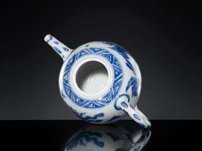 Lot 172 - A BLUE AND WHITE ‘QILIN AND PHOENIX’ TEAPOT AND COVER, TRANSITIONAL PERIOD, FROM THE HATCHER CARGO