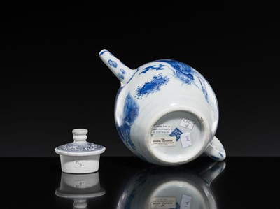 Lot 172 - A BLUE AND WHITE ‘QILIN AND PHOENIX’ TEAPOT AND COVER, TRANSITIONAL PERIOD, FROM THE HATCHER CARGO
