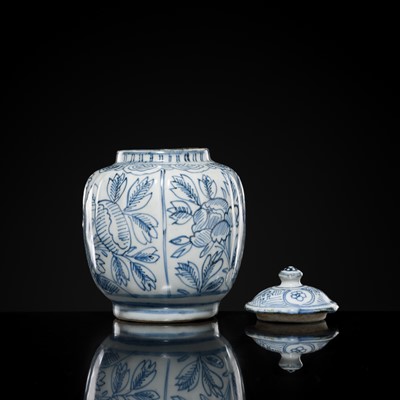 Lot 156 - A BLUE AND WHITE ‘FLORAL’ LOBED JAR AND COVER, WANLI PERIOD