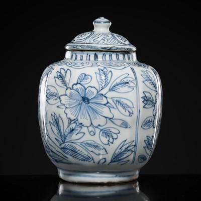 Lot 156 - A BLUE AND WHITE ‘FLORAL’ LOBED JAR AND COVER, WANLI PERIOD