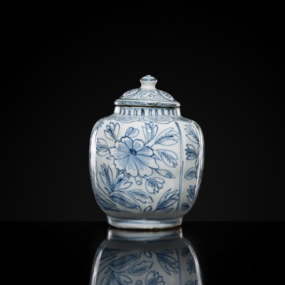 Lot 156 - A BLUE AND WHITE ‘FLORAL’ LOBED JAR AND COVER, WANLI PERIOD