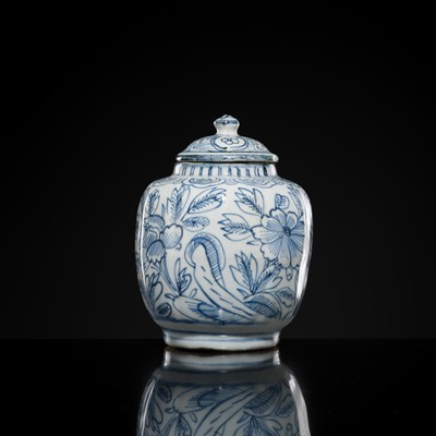 Lot 156 - A BLUE AND WHITE ‘FLORAL’ LOBED JAR AND COVER, WANLI PERIOD