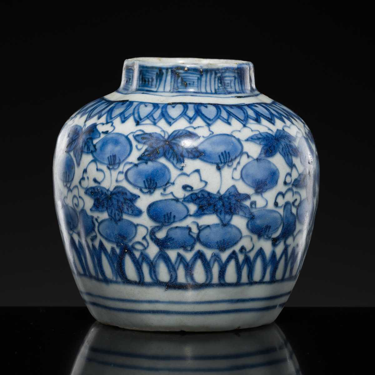 Lot 169 - A MELON-FORM ‘GOURD-VINE’ JAR, TRANSITIONAL PERIOD, FROM THE HATCHER CARGO