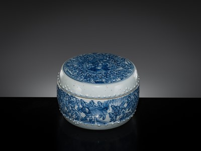 Lot 168 - A BLUE AND WHITE ‘MYTHICAL BEASTS AND HUNDRED BOYS’ DRUM-FORM BOX AND COVER, KANGXI PERIOD