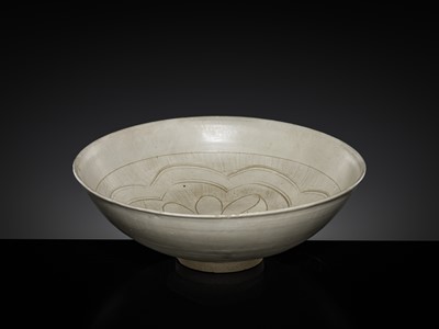 Lot 146 - A CARVED CIZHOU ‘LOTUS’ BOWL, NORTHERN SONG-YUAN DYNASTY