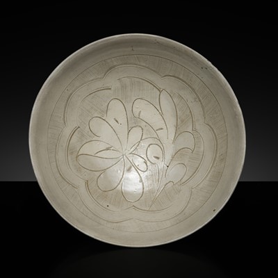 Lot 146 - A CARVED CIZHOU ‘LOTUS’ BOWL, NORTHERN SONG-YUAN DYNASTY