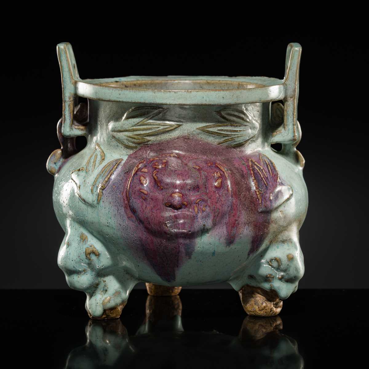 Lot 9 - A LARGE AND RARE JUNYAO PURPLE-SPLASHED TRIPOD CENSER, YUAN DYNASTY