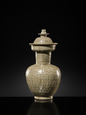 Lot 5 - A RARE CARVED LONGQUAN CELADON VASE AND COVER, NORTHERN SONG DYNASTY