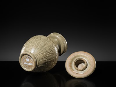 Lot 5 - A RARE CARVED LONGQUAN CELADON VASE AND COVER, NORTHERN SONG DYNASTY