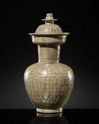 Lot 5 - A RARE CARVED LONGQUAN CELADON VASE AND COVER, NORTHERN SONG DYNASTY