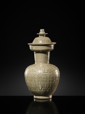 Lot 5 - A RARE CARVED LONGQUAN CELADON VASE AND COVER, NORTHERN SONG DYNASTY