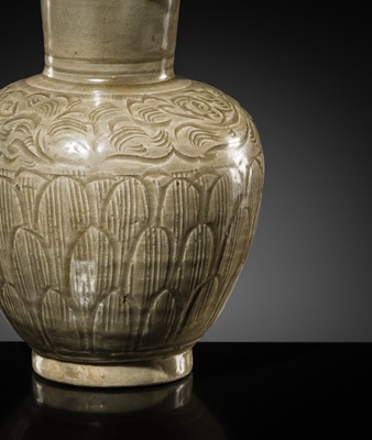 Lot 5 - A RARE CARVED LONGQUAN CELADON VASE AND COVER, NORTHERN SONG DYNASTY