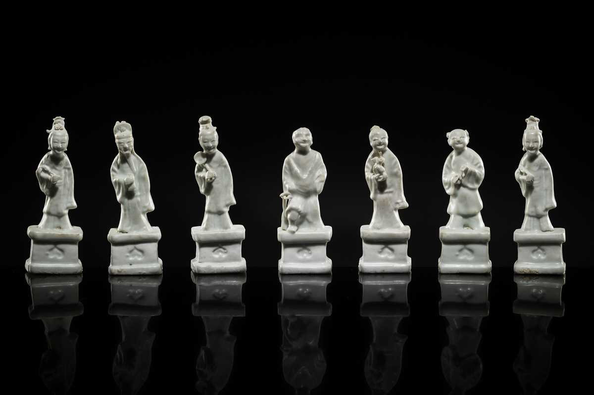 Lot 33 - A RARE GROUP OF SEVEN DEHUA GLAZED FIGURES OF THE DAOIST IMMORTALS, BAXIAN, QIANLONG PERIOD, FROM THE NANKING CARGO