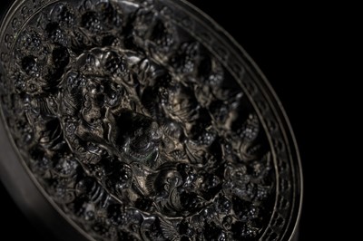 Lot 198 - A SMALL ‘LION AND GRAPEVINE’ BRONZE MIRROR, TANG DYNASTY