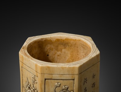 Lot 109 - A RARE HEPTAGONAL IVORY BRUSH POT, BITONG, EARLY QING DYNASTY