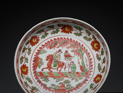 Lot 154 - AN IRON-RED, YELLOW AND GREEN ENAMELED ‘EQUESTRIAN’ DISH, MING DYNASTY