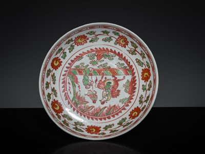 Lot 154 - AN IRON-RED, YELLOW AND GREEN ENAMELED ‘EQUESTRIAN’ DISH, MING DYNASTY