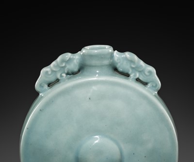 Lot 31 - A CELADON GLAZED MOONFLASK, BIANHU, 18TH CENTURY