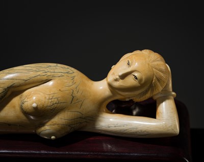 Lot 278 - AN IVORY FIGURE OF A MEDICINE DOLL, LATE QING DYNASTY