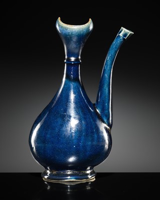 Lot 29 - A BLUE-GLAZED EWER FOR THE ISLAMIC MARKET, EARLY 18TH CENTURY