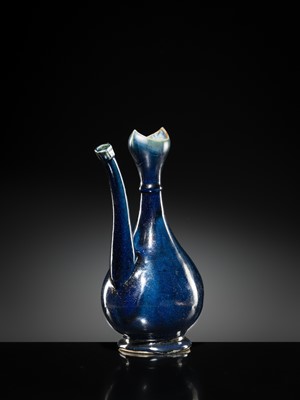 Lot 29 - A BLUE-GLAZED EWER FOR THE ISLAMIC MARKET, EARLY 18TH CENTURY