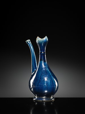 Lot 29 - A BLUE-GLAZED EWER FOR THE ISLAMIC MARKET, EARLY 18TH CENTURY