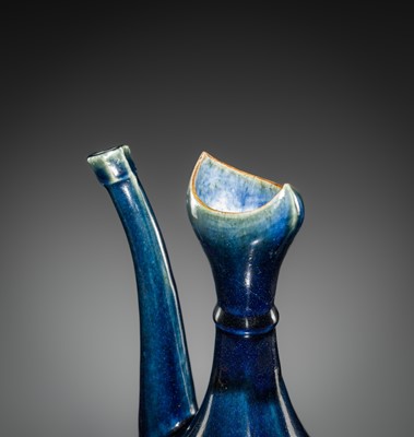 Lot 29 - A BLUE-GLAZED EWER FOR THE ISLAMIC MARKET, EARLY 18TH CENTURY
