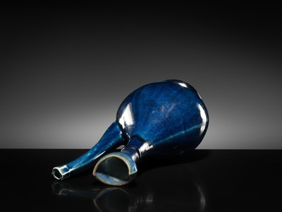 Lot 29 - A BLUE-GLAZED EWER FOR THE ISLAMIC MARKET, EARLY 18TH CENTURY