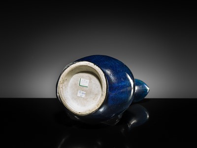 Lot 29 - A BLUE-GLAZED EWER FOR THE ISLAMIC MARKET, EARLY 18TH CENTURY