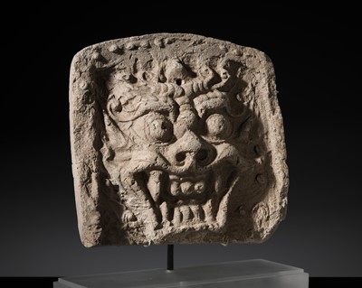 Lot 263 - A MOLDED POTTERY ‘BEAST MASK’ TEMPLE ROOF TILE, UNIFIED SILLA DYNASTY