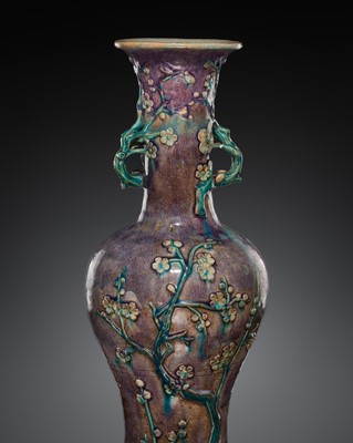Lot 152 - A FAHUA-TYPE AUBERGINE-GROUND ‘PRUNUS’ BALUSTER VASE, MING DYNASTY