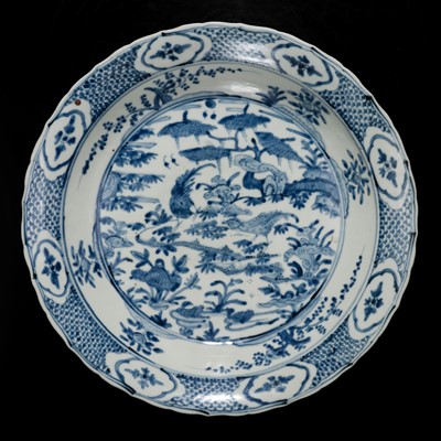 Lot 161 - A LARGE SWATOW BLUE AND WHITE ‘PHEASANTS AND DUCKS’ BRACKET-LOBED CHARGER, 16TH CENTURY