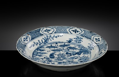 Lot 161 - A LARGE SWATOW BLUE AND WHITE ‘PHEASANTS AND DUCKS’ BRACKET-LOBED CHARGER, 16TH CENTURY