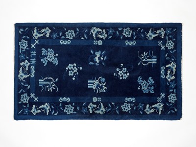 Lot 1007 - A ‘FLORAL’ CHINESE WOOLLEN RUG