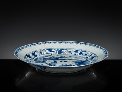 Lot 163 - A LARGE BLUE AND WHITE ‘SCHOLAR’ DISH, WANLI PERIOD